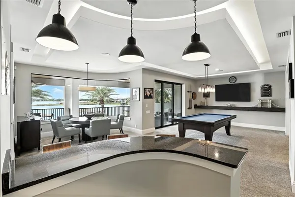 a close view of a stove top oven and sitting space