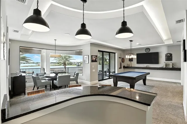 a close view of a stove top oven and sitting space