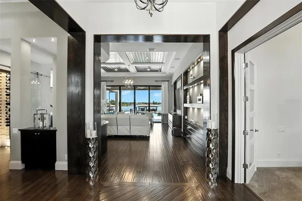 a kitchen with stainless steel appliances granite countertop a sink a stove and a refrigerator