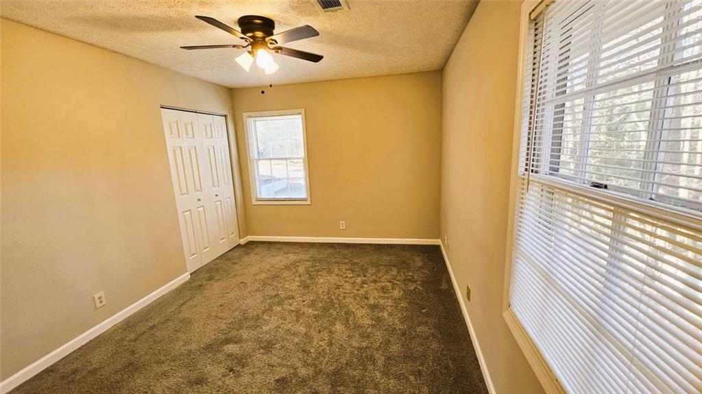 2172 Nancy Way Loganville, GA 30052 - Photo 16 of 21 a view of an empty room and window