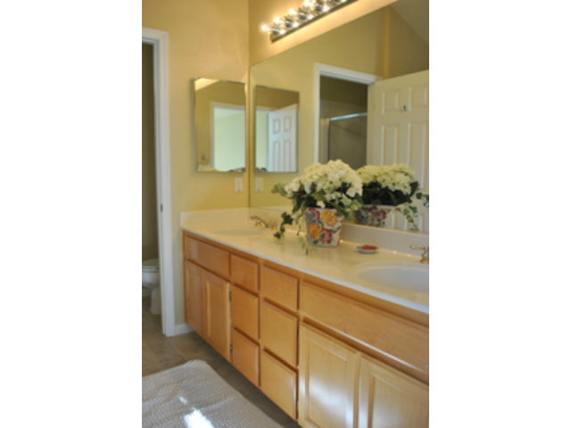 517 Monterey Road Pacifica, CA 94044 - Photo 11 of 17 a bathroom with a sink and a mirror