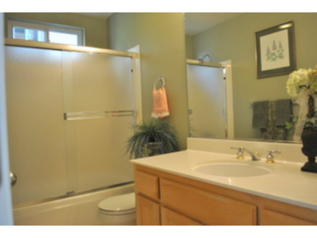 517 Monterey Road Pacifica, CA 94044 - Photo 13 of 17 a bathroom with a sink and mirror