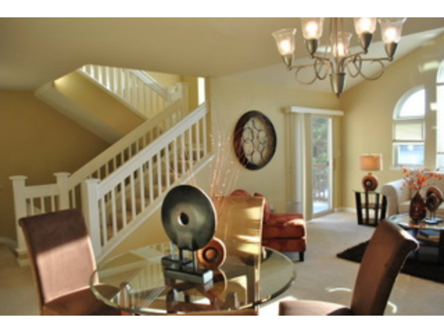 517 Monterey Road Pacifica, CA 94044 - Photo 3 of 17 a living room with furniture and a clock