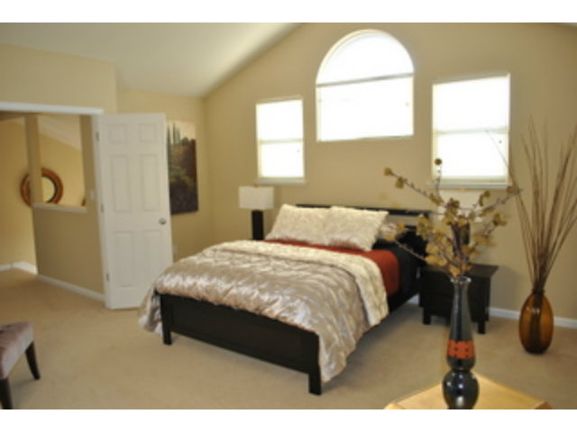 517 Monterey Road Pacifica, CA 94044 - Photo 9 of 17 a bedroom with a bed and a window