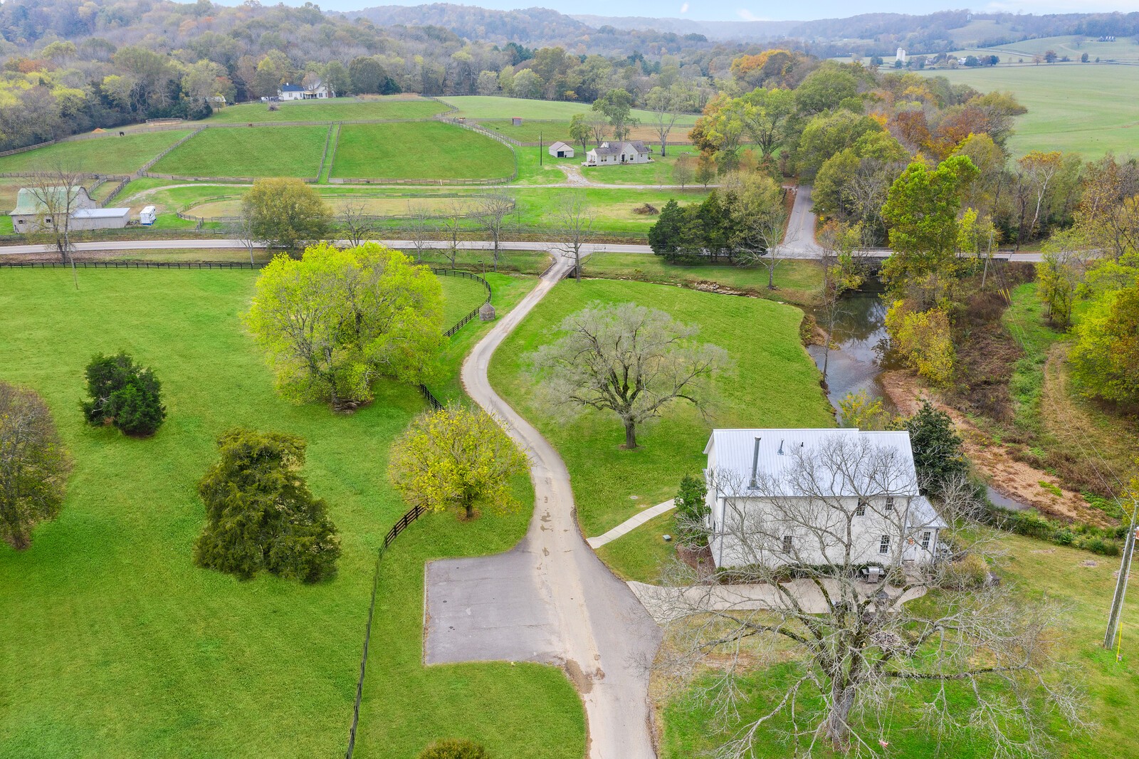 3350 Bailey Road Franklin, TN 37064 - Photo 26 of 37 an aerial view of a golf course with a lake view