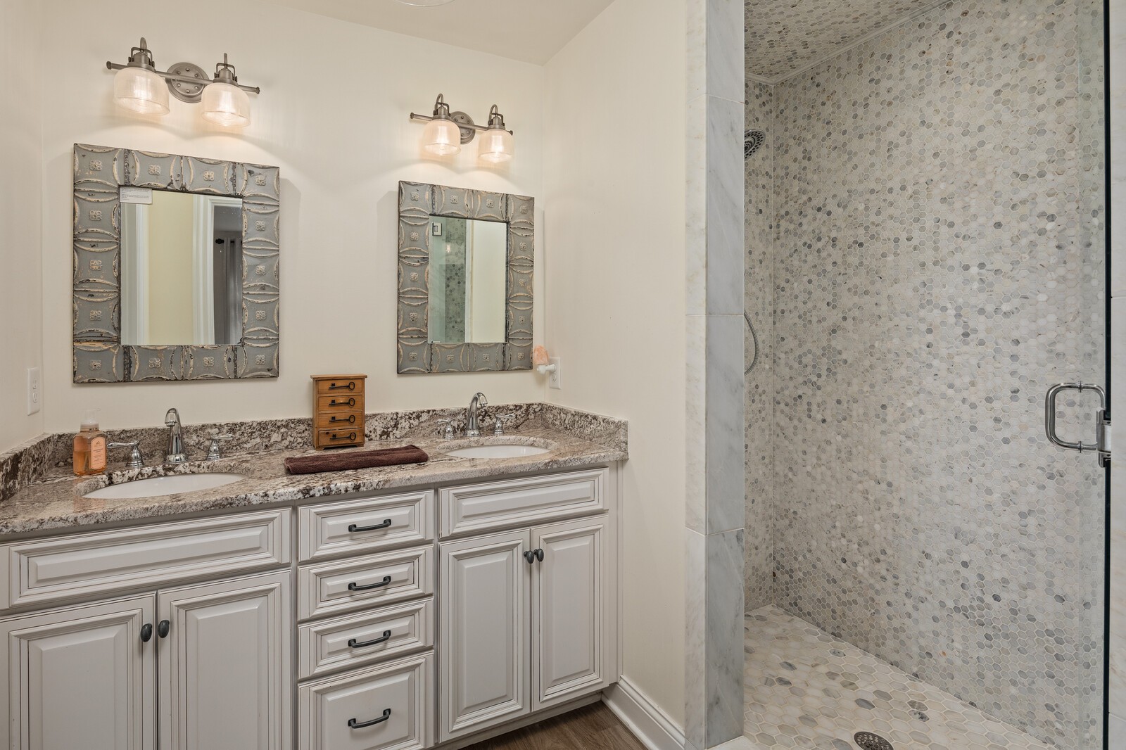 3350 Bailey Road Franklin, TN 37064 - Photo 36 of 37 a bathroom with a granite countertop sink vanity mirror and shower