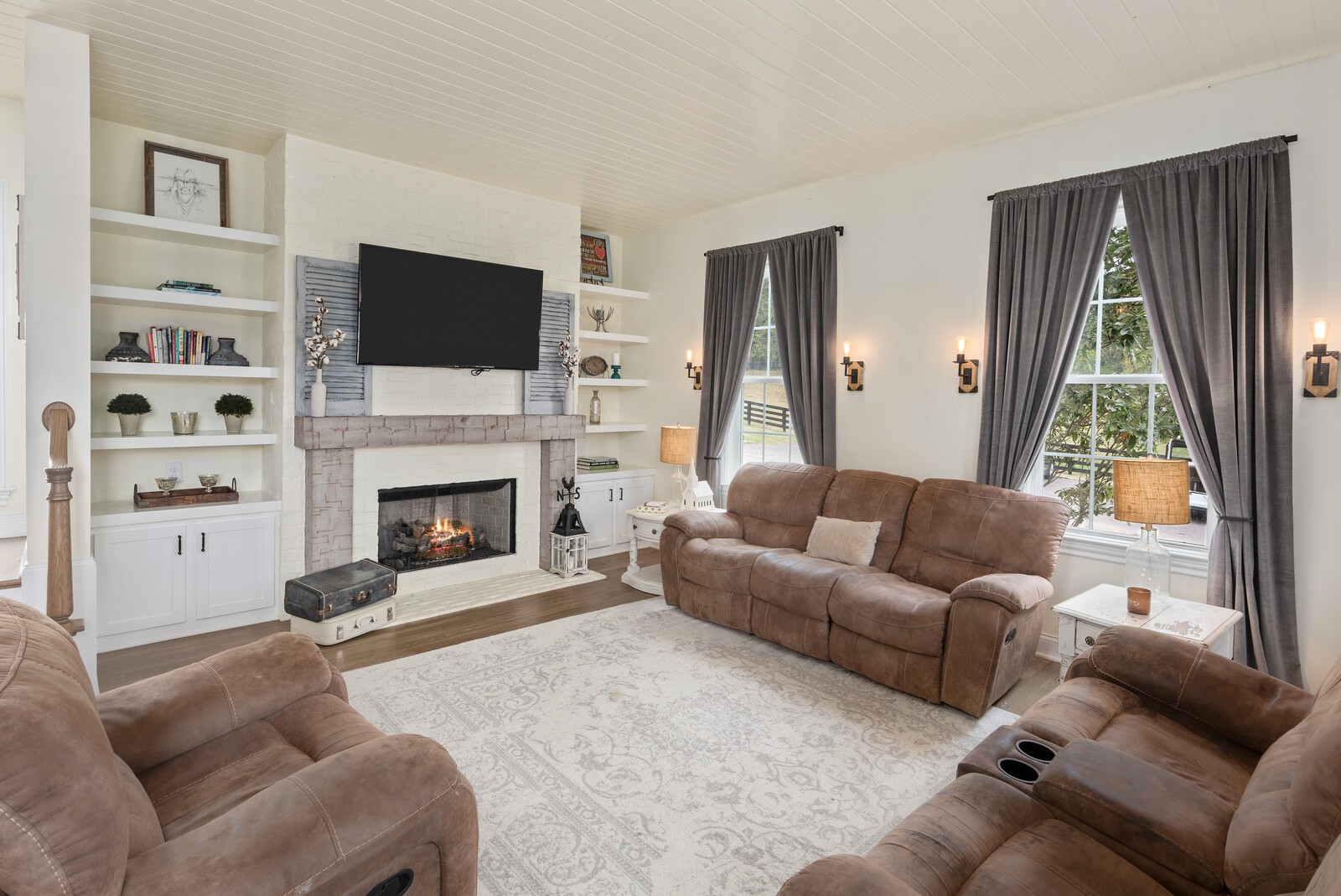 3350 Bailey Road Franklin, TN 37064 - Photo 8 of 37 a living room with furniture fireplace and flat screen tv