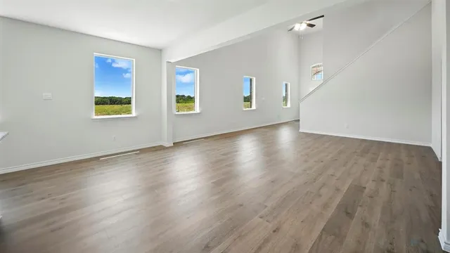 a view of kitchen with wooden floor