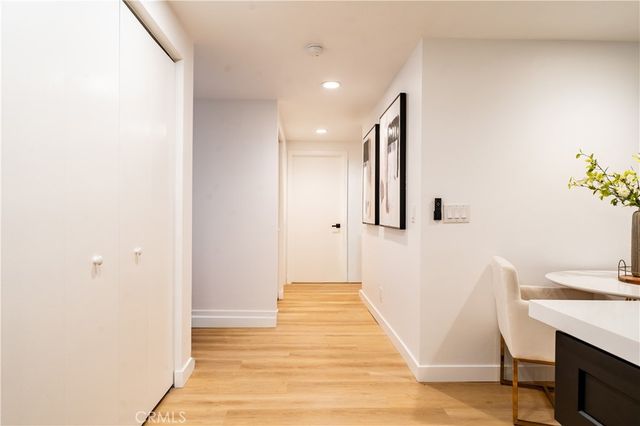 a view of a hallway with entryway