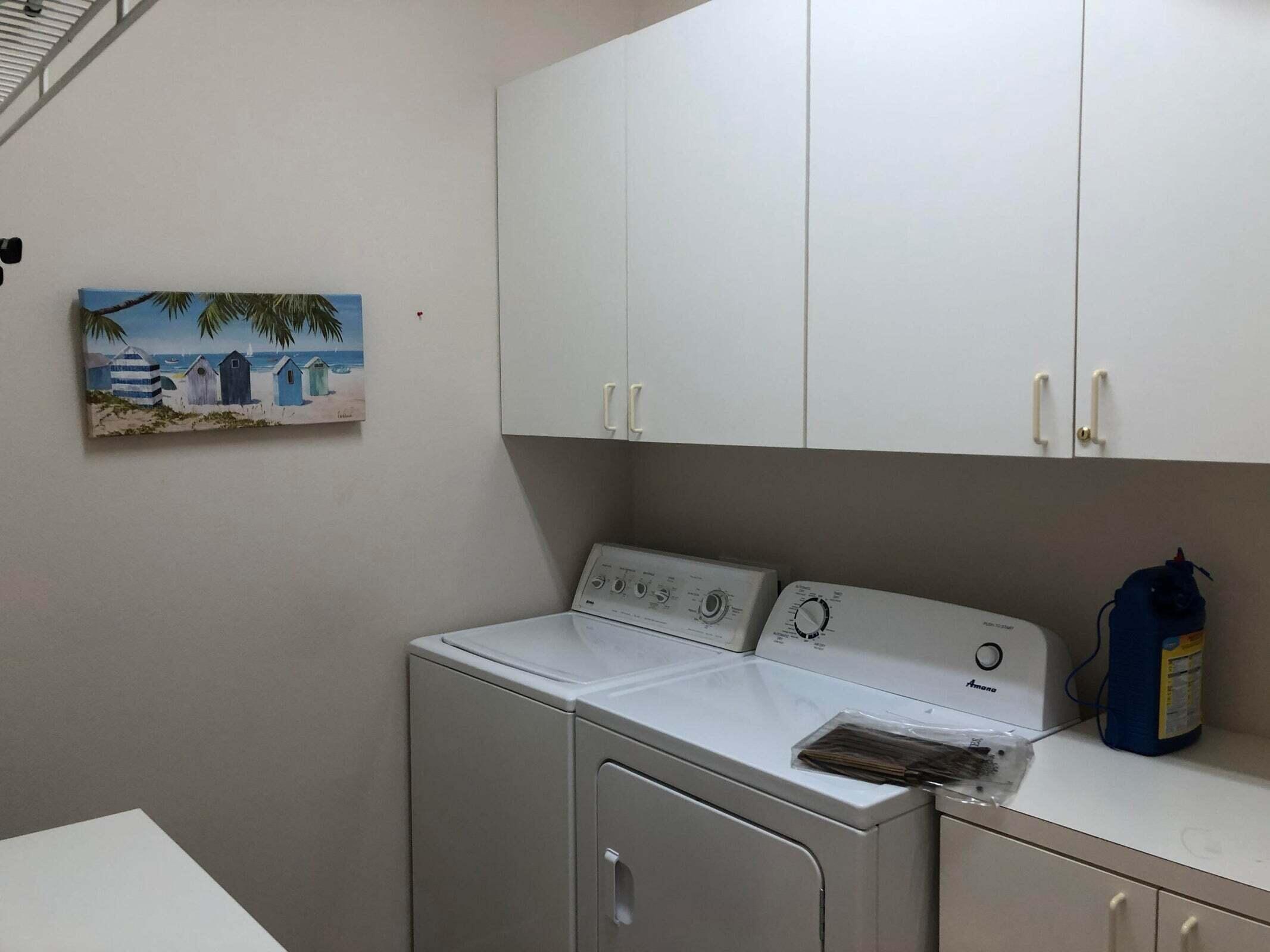 36583 Fan Palm Way Palm Desert, CA 92211 - Photo 13 of 16 a utility room with dryer and washer