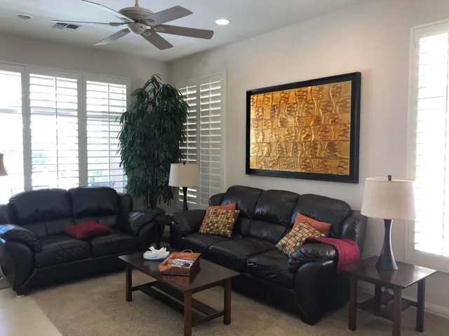 a kitchen with sink refrigerator and window