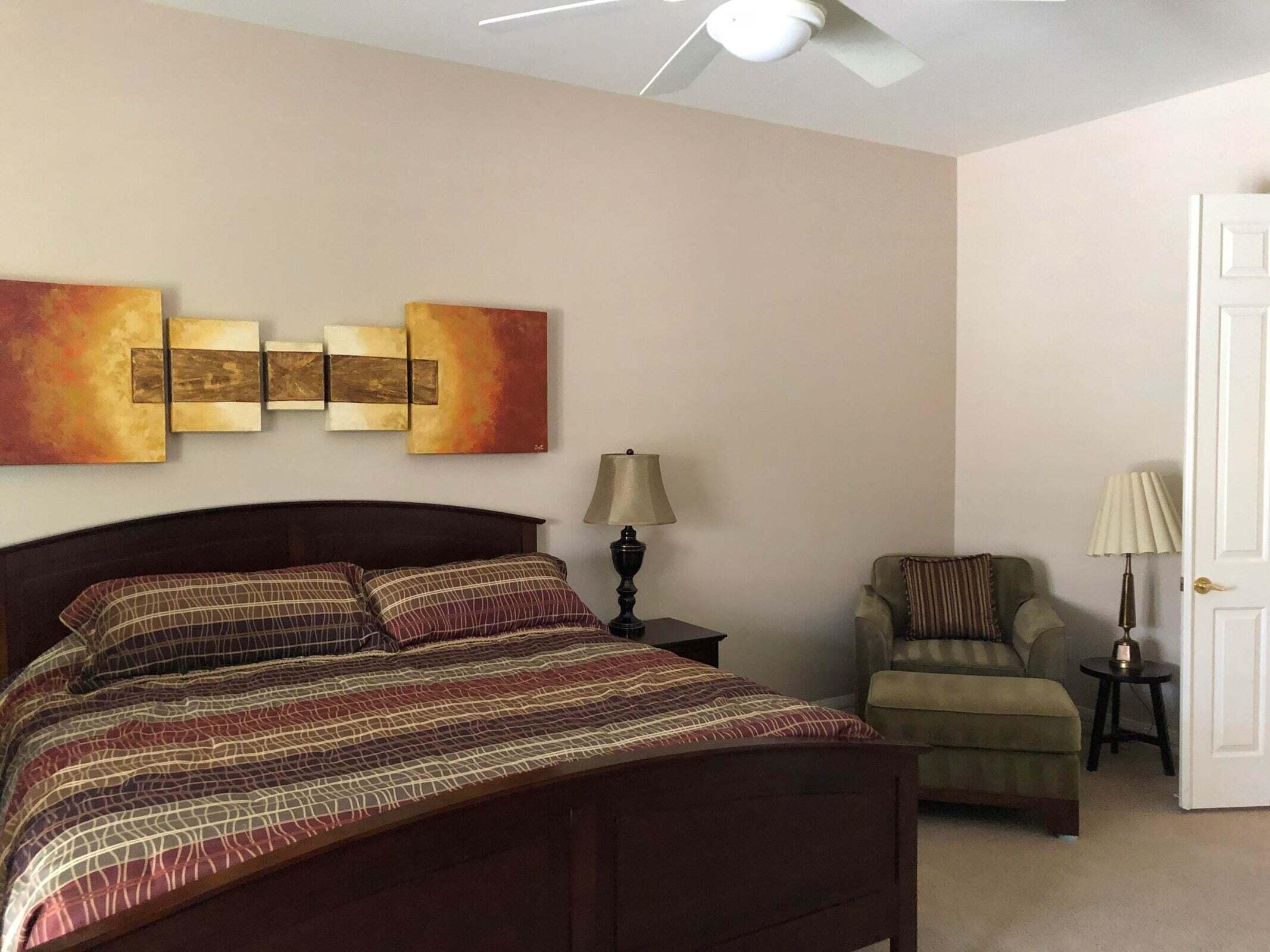 36583 Fan Palm Way Palm Desert, CA 92211 - Photo 8 of 16 a bedroom with a bed and a couch