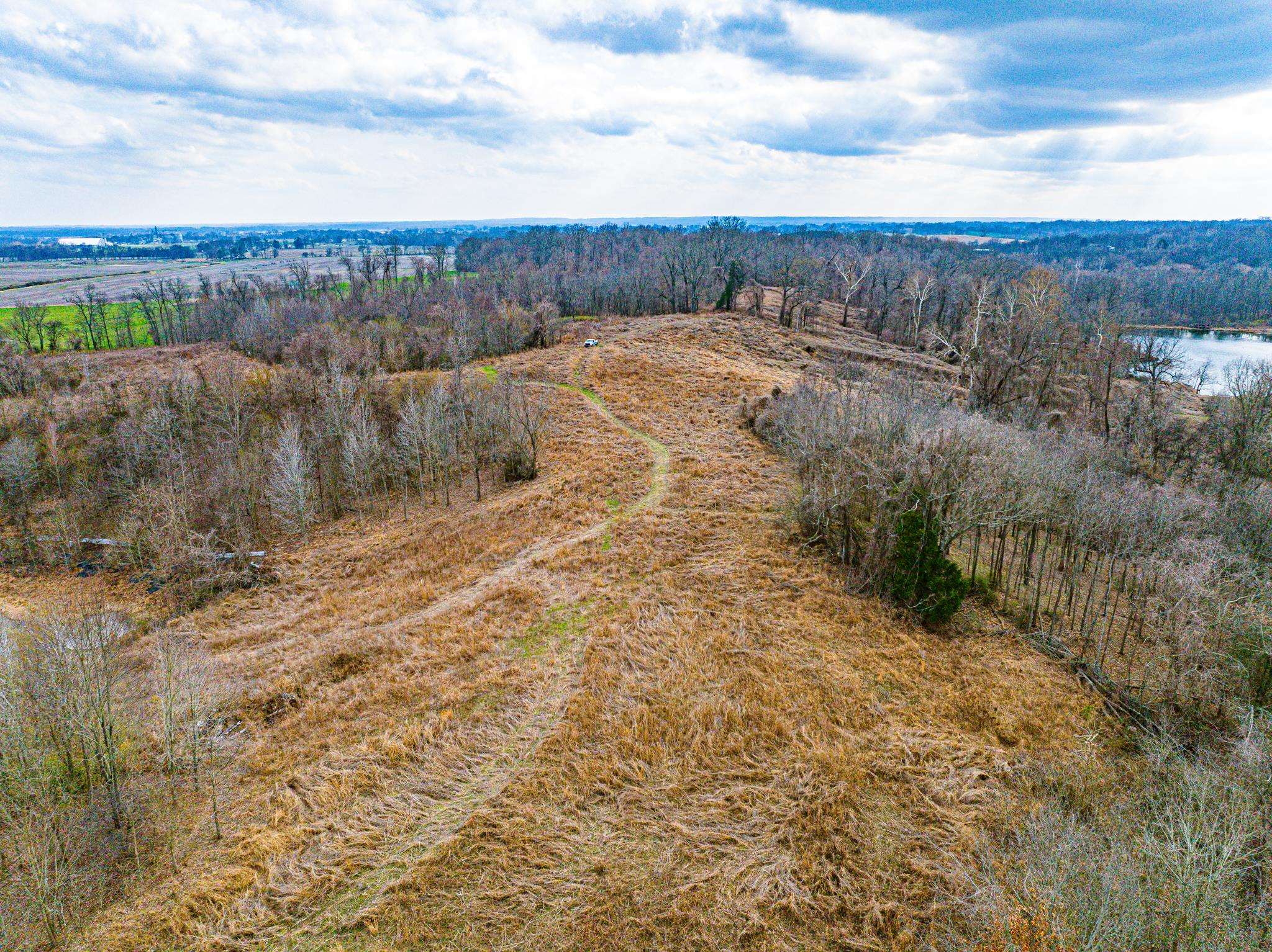 0 Minnick Elbridge Road Hornbeak, TN 38240 - Photo 19 of 31 Drone / aerial view of a large body of water