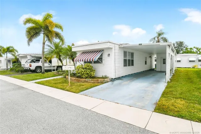 a view of backyard of a house