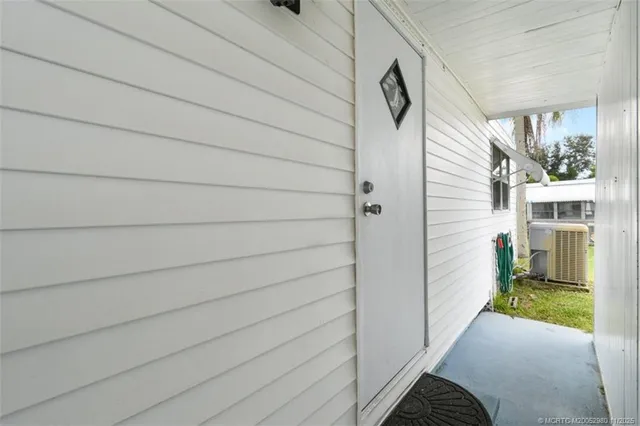 a view of a house with a street
