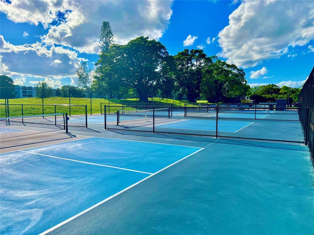 17 Markham A, Unit 17 Deerfield Beach, FL 33442 - Photo 41 of 50 a view of a tennis court