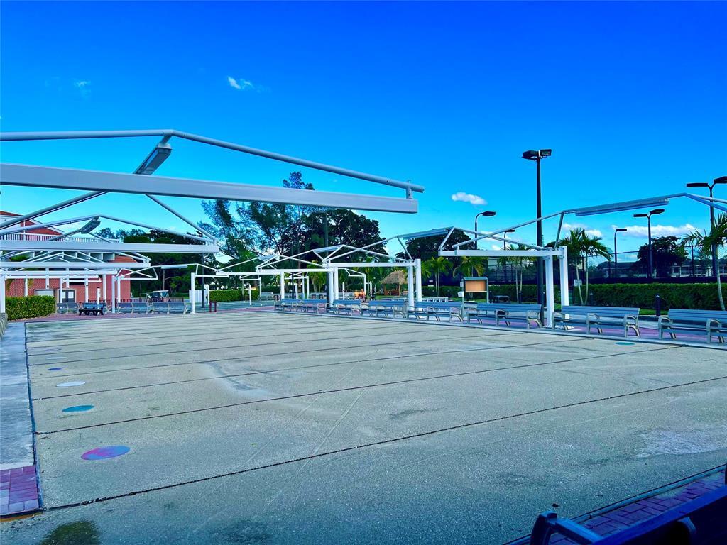 17 Markham A, Unit 17 Deerfield Beach, FL 33442 - Photo 48 of 50 a view of a building with a porch