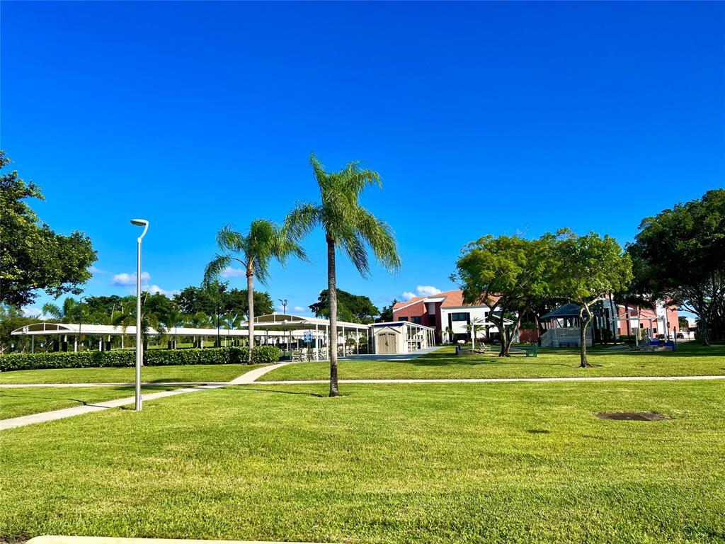 17 Markham A, Unit 17 Deerfield Beach, FL 33442 - Photo 49 of 50 a view of a park with houses