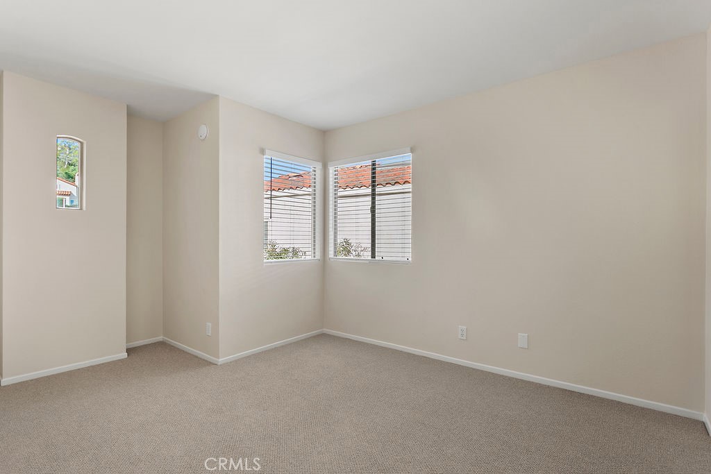 30942 Calle Moraga Laguna Niguel, CA 92677 - Photo 21 of 40 an empty room with windows
