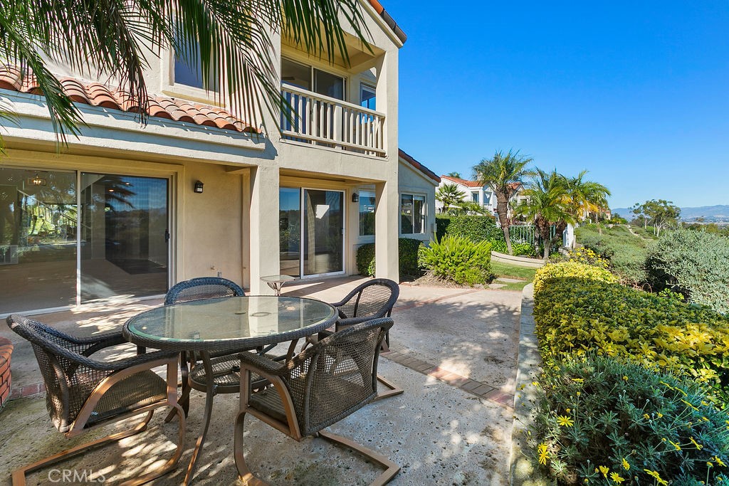 30942 Calle Moraga Laguna Niguel, CA 92677 - Photo 27 of 40 a view of a patio with table and chairs and potted plants