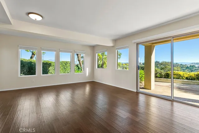 a view of a kitchen with a stove top oven