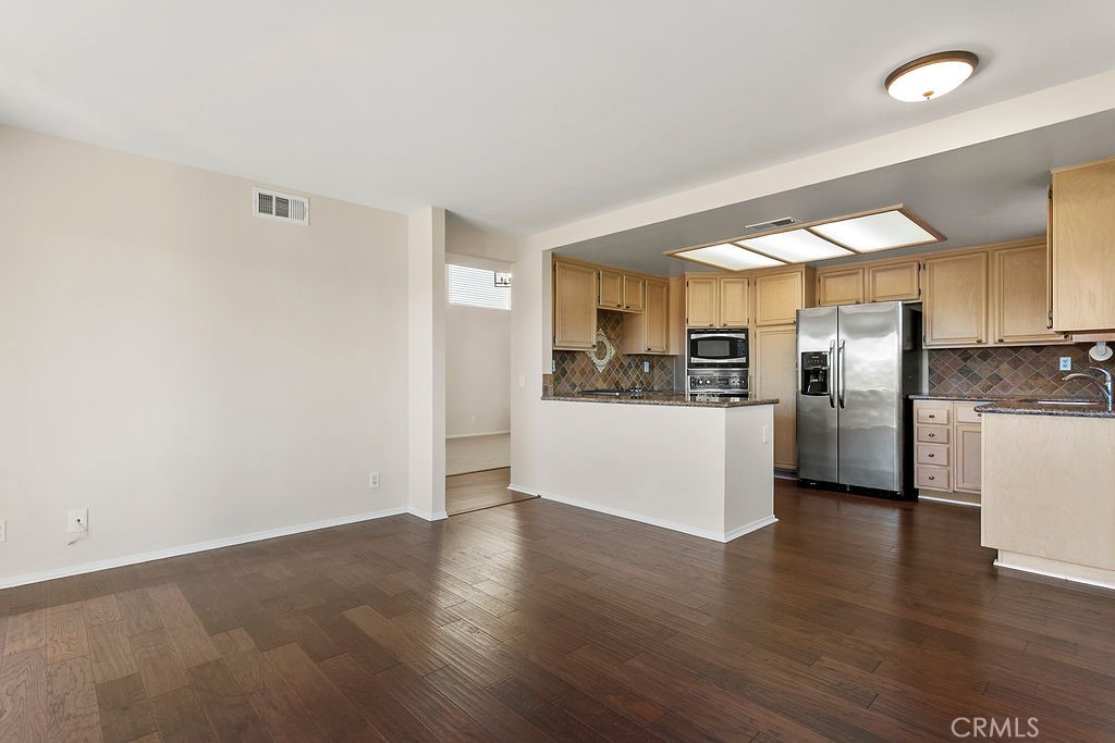 30942 Calle Moraga Laguna Niguel, CA 92677 - Photo 8 of 40 a view of kitchen with stainless steel appliances refrigerator oven