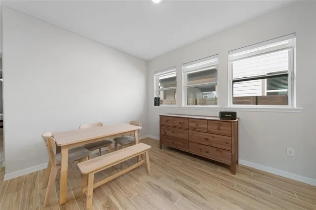 a room with chair and window