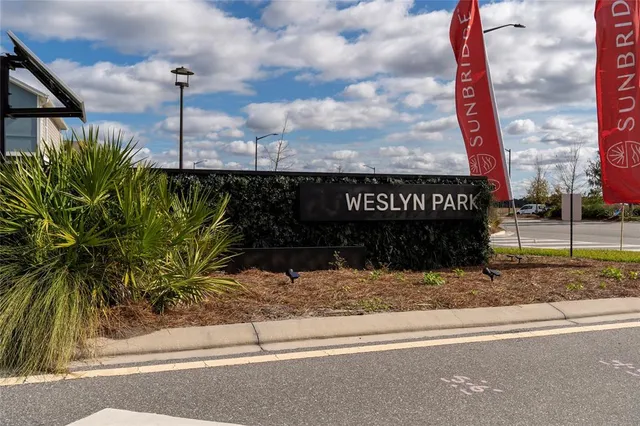 a sign that is on the side of a road