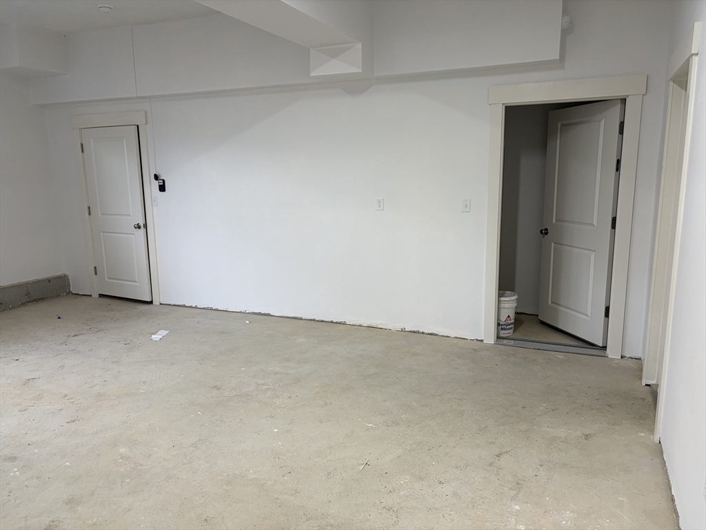 76 Valmor Street Worcester, MA 01604 - Photo 4 of 20 a view of an empty room and entryway