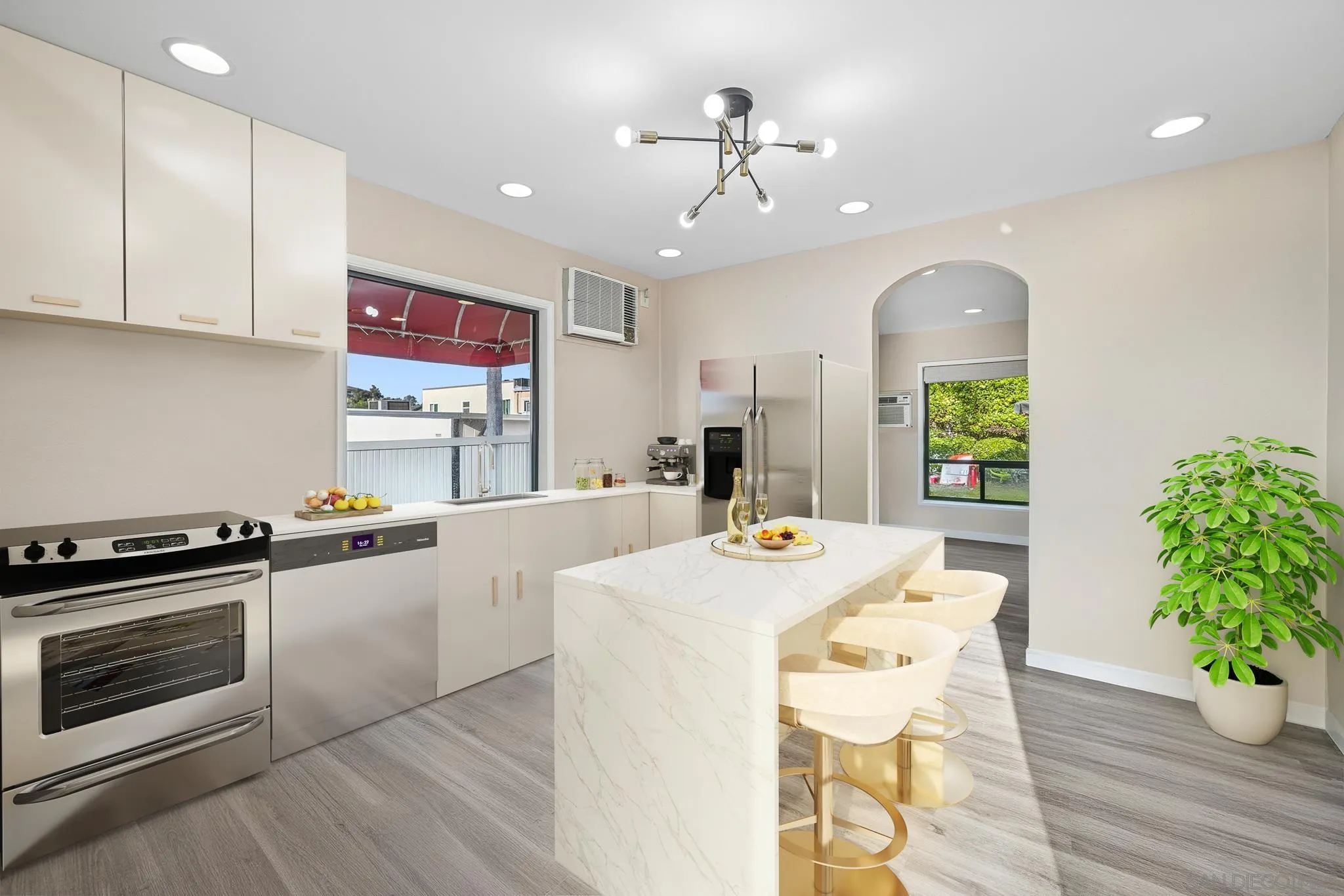 a kitchen with a table and chairs
