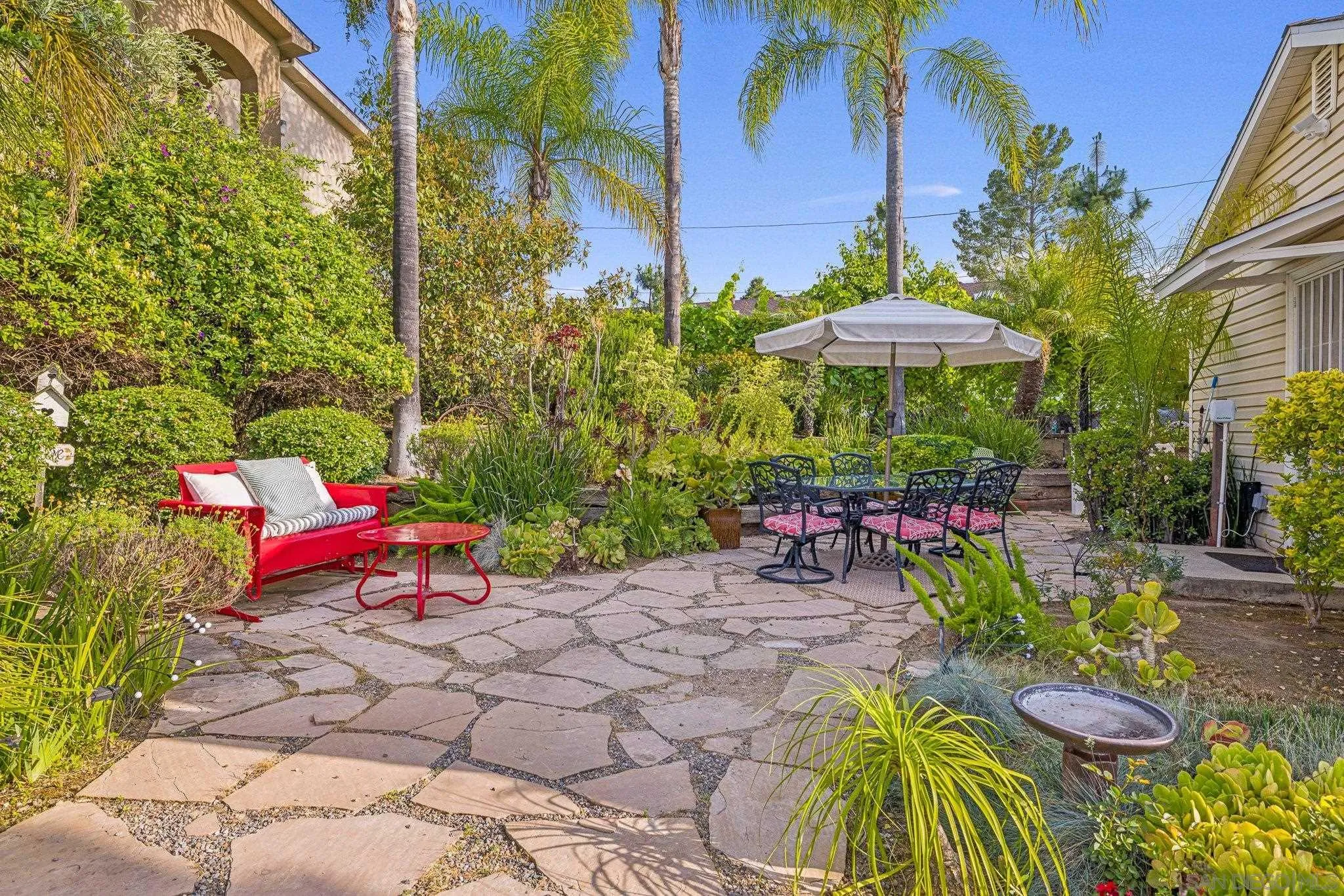 1350 Marshall Road Alpine, CA 91901 - Photo 22 of 23 a view of a chairs and table in a backyard