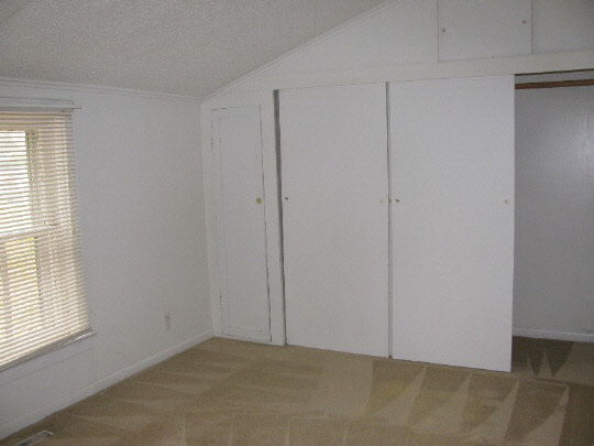 116 South 9th Street Rochelle, IL 61068 - Photo 7 of 9 an empty room with windows
