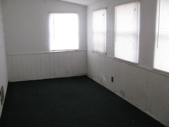 116 South 9th Street Rochelle, IL 61068 - Photo 9 of 9 an empty room with a window