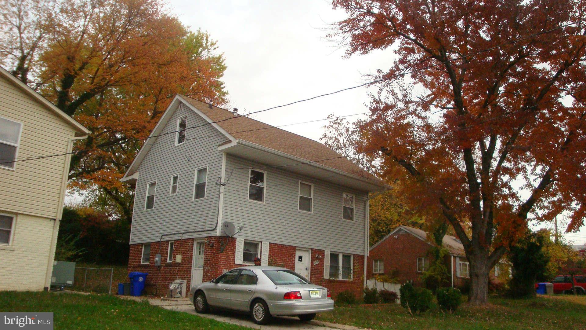 2505 Weisman Road Silver Spring, MD 20902 - Photo 1 of 19 a front view of a house with garden