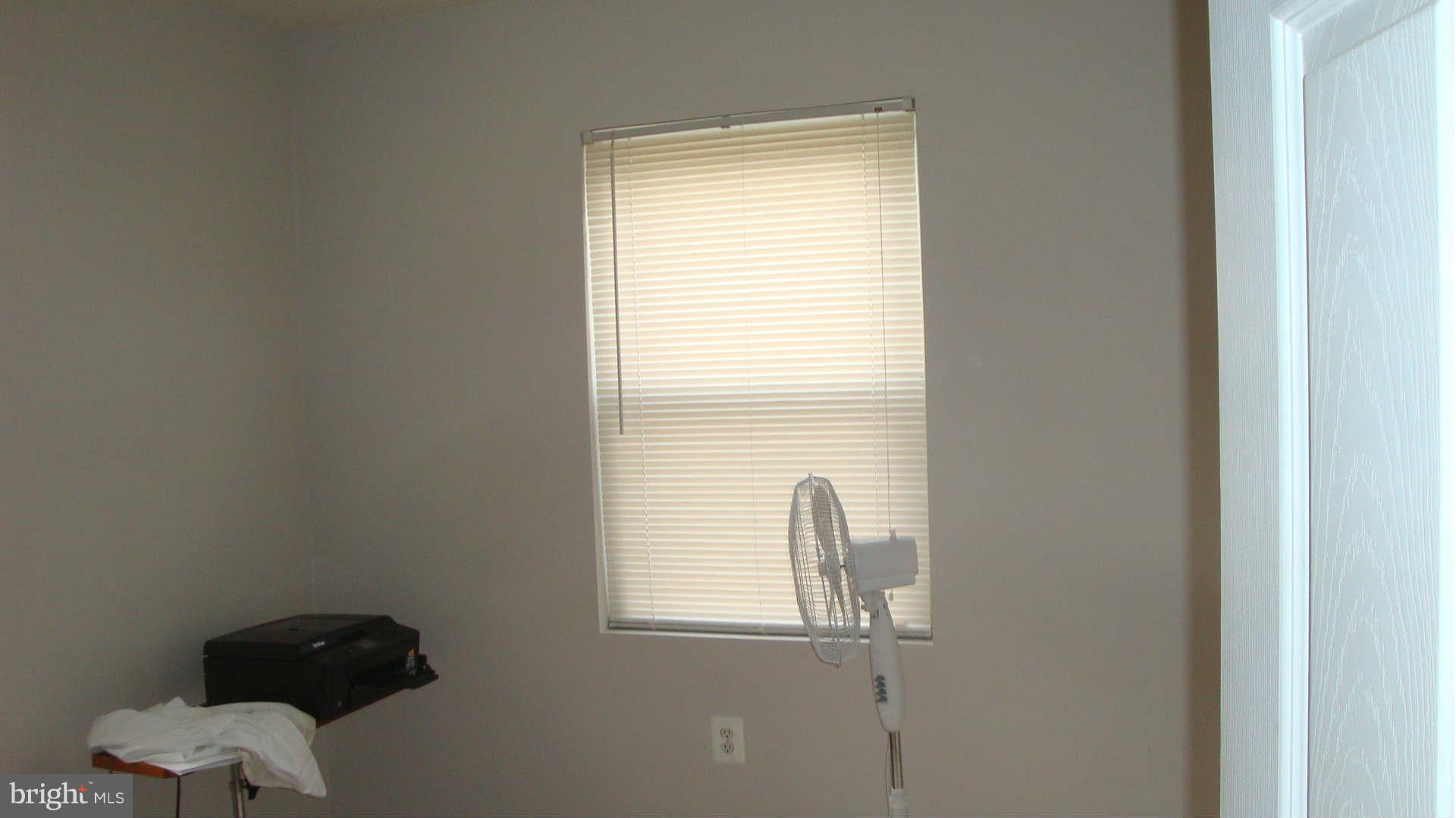 2505 Weisman Road Silver Spring, MD 20902 - Photo 16 of 19 a view of a livingroom with a window