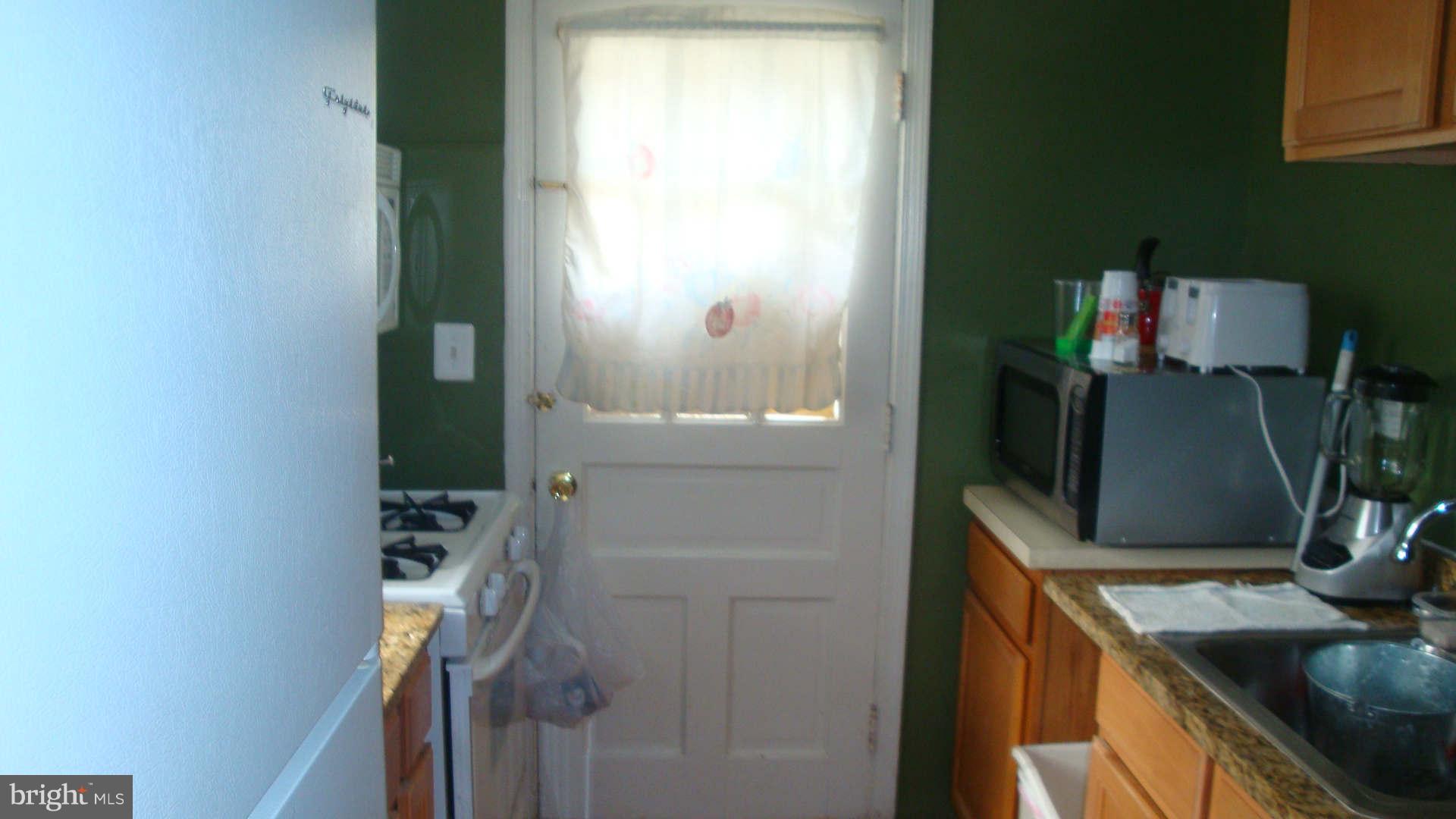2505 Weisman Road Silver Spring, MD 20902 - Photo 6 of 19 a bathroom with a sink and mirror