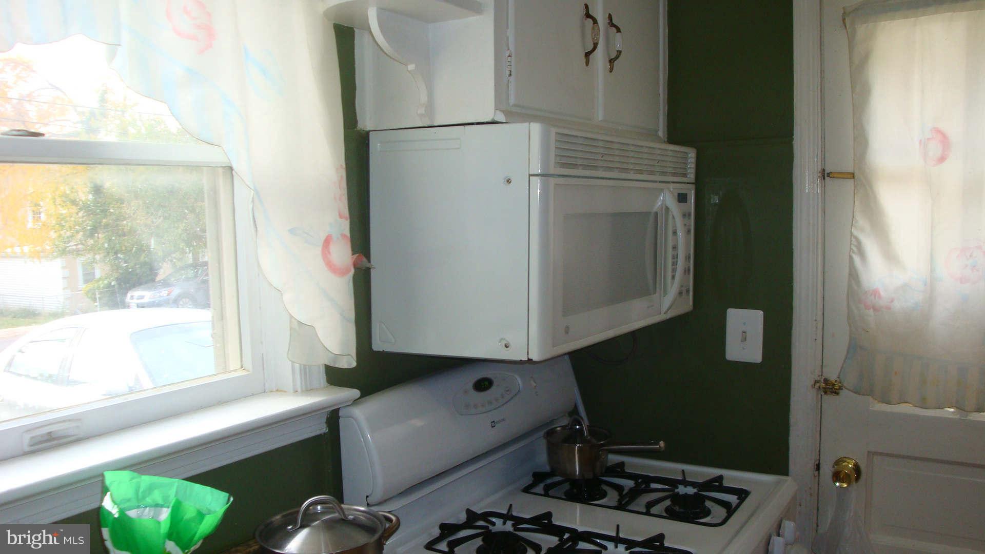2505 Weisman Road Silver Spring, MD 20902 - Photo 7 of 19 a room with storage and utility