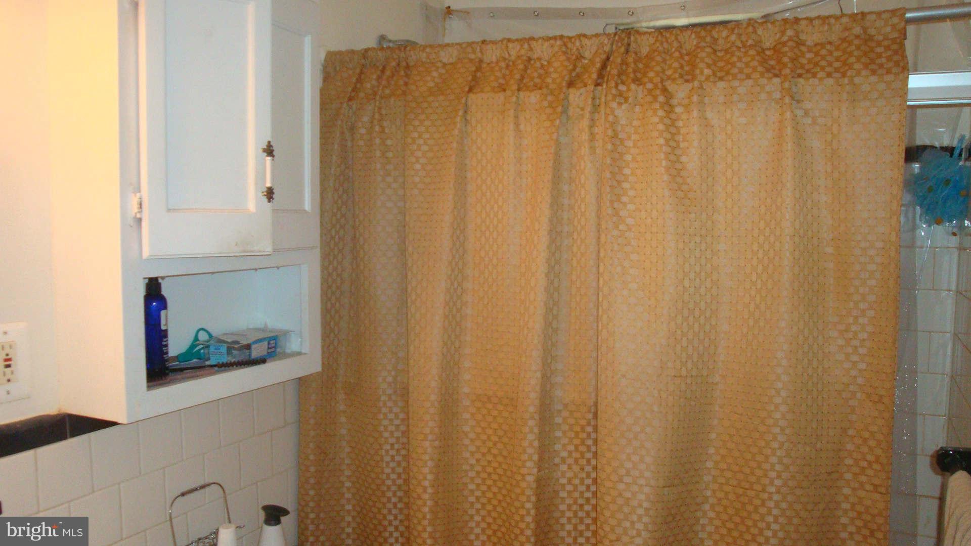 2505 Weisman Road Silver Spring, MD 20902 - Photo 9 of 19 a close up view of curtain