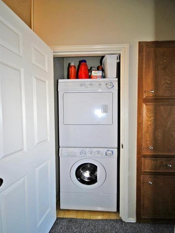 4409 Speedway, Unit 201 Austin, TX 78751 - Photo 15 of 16 Laundry area featuring stacked washer / drying machine
