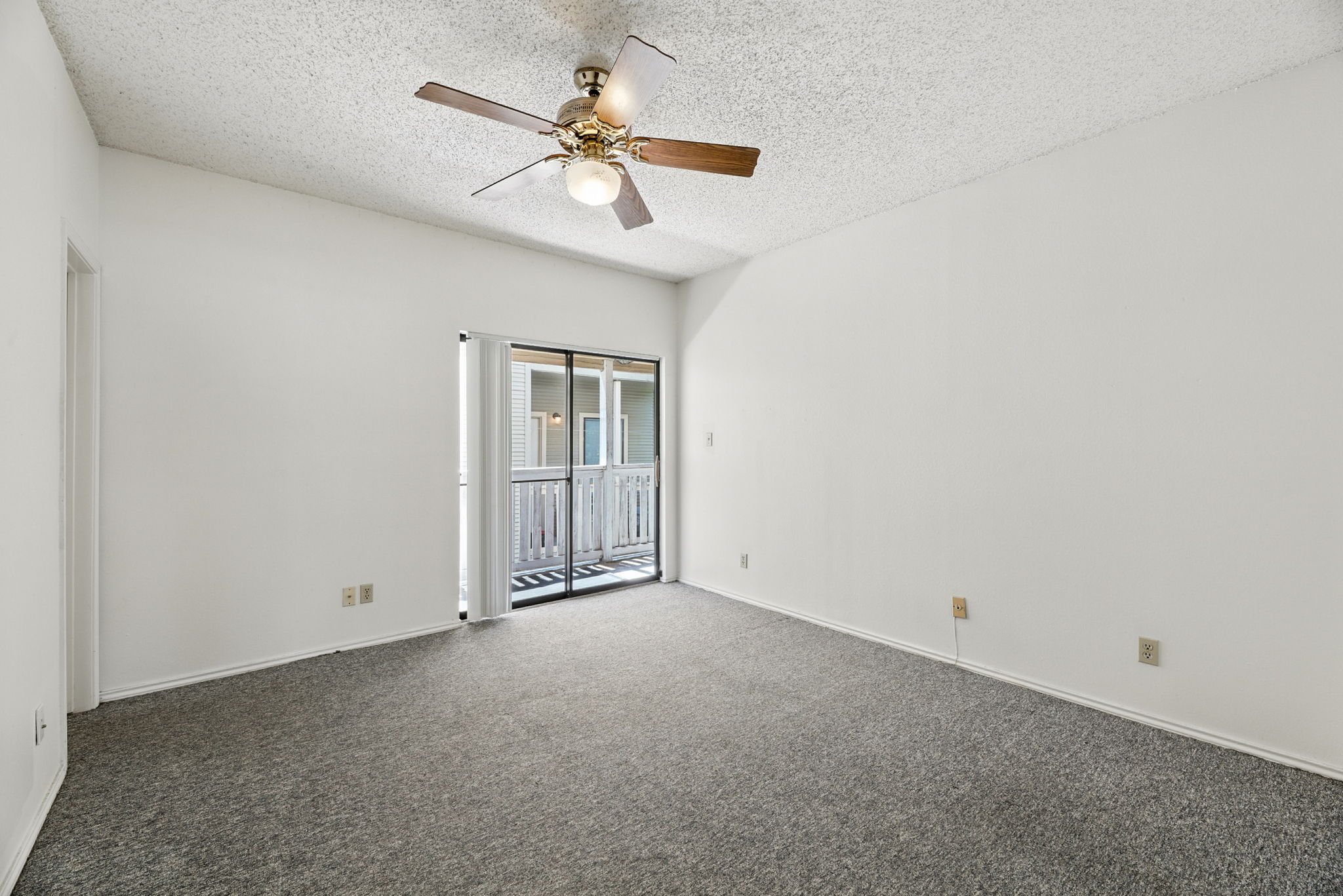 4409 Speedway, Unit 201 Austin, TX 78751 - Photo 8 of 16 an empty room with chandelier fan