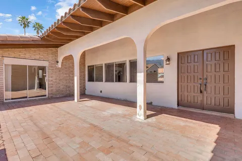 a kitchen with a refrigerator and countertop