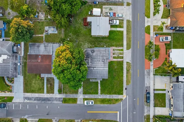 front view of a house with a garden