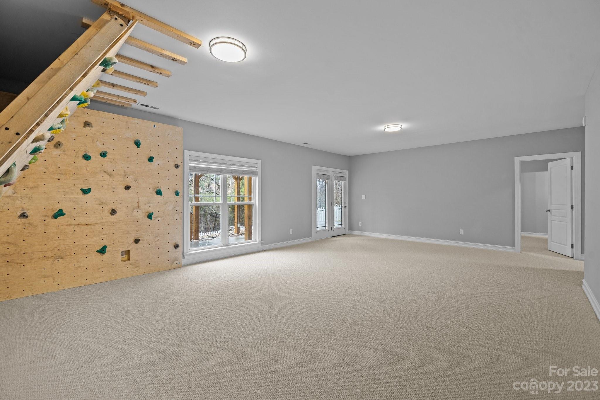 10304 Glenmeade Road Cornelius, NC 28031 - Photo 15 of 47 a view of an empty room with a window