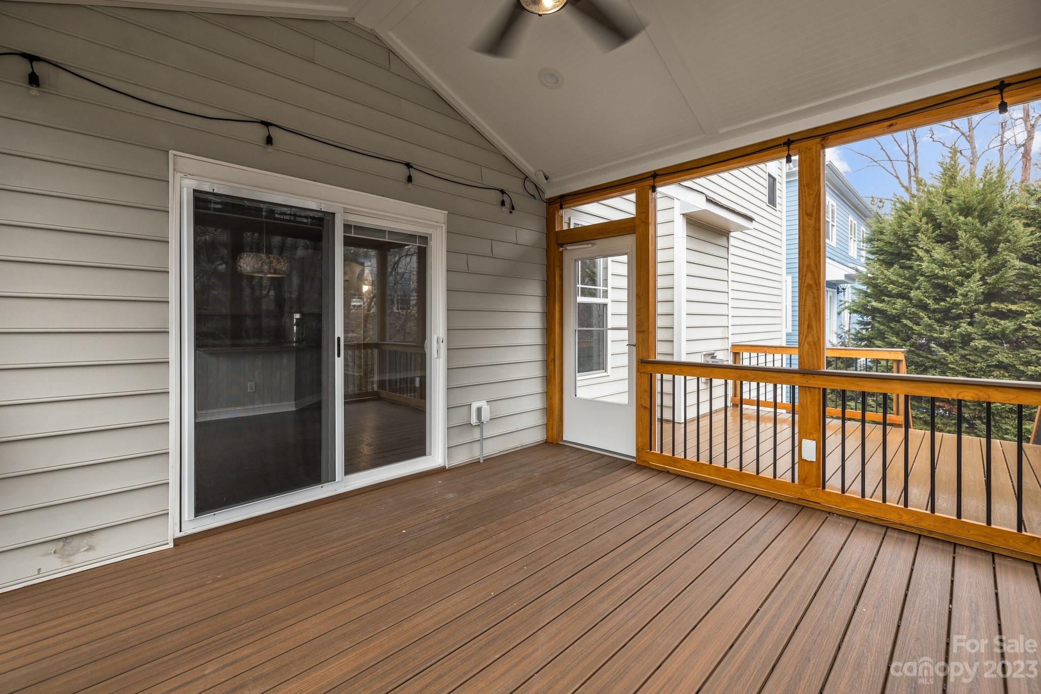 10304 Glenmeade Road Cornelius, NC 28031 - Photo 19 of 47 a view of a balcony with wooden floor