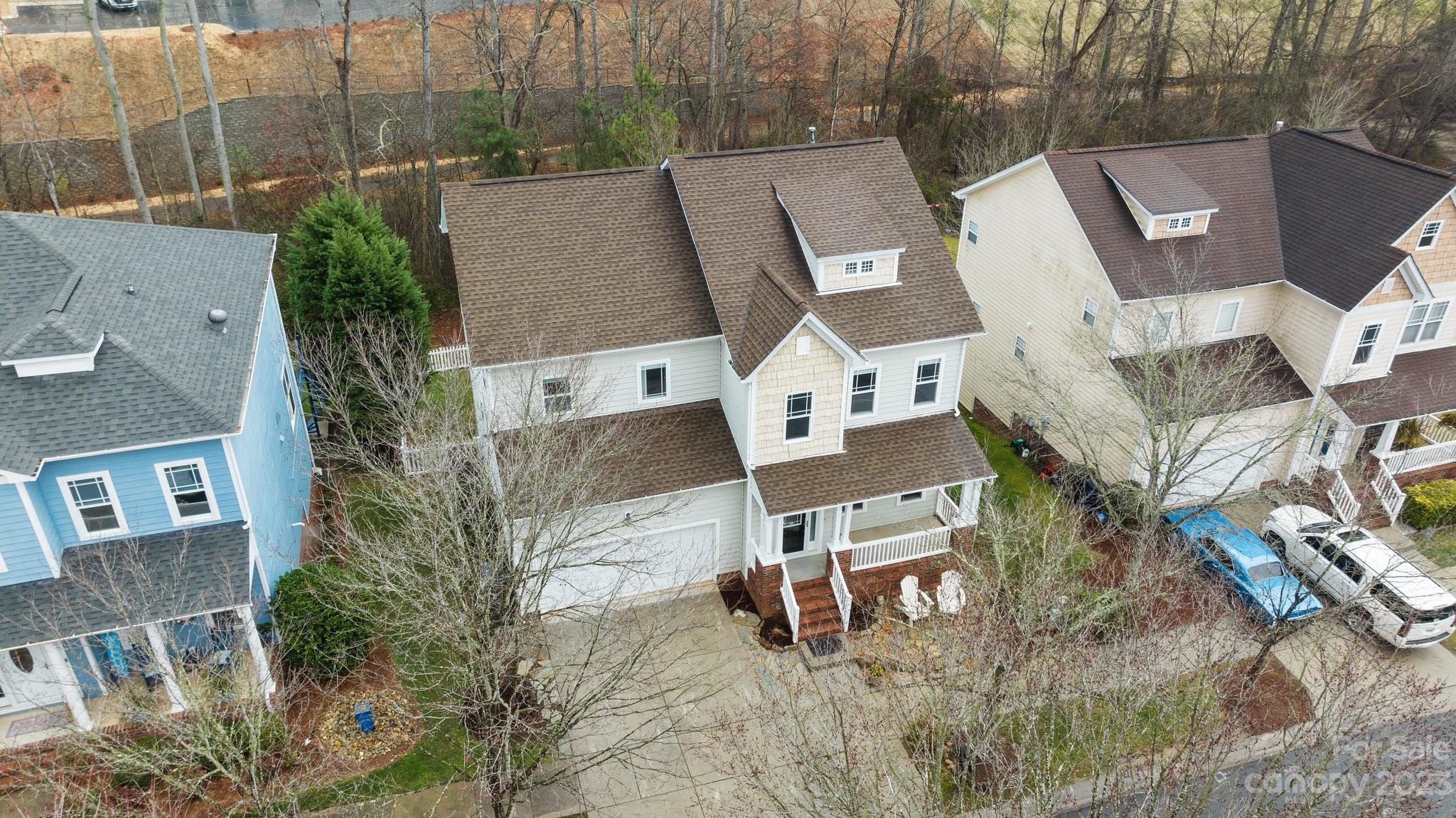 10304 Glenmeade Road Cornelius, NC 28031 - Photo 44 of 47 an aerial view of residential house with outdoor space and parking