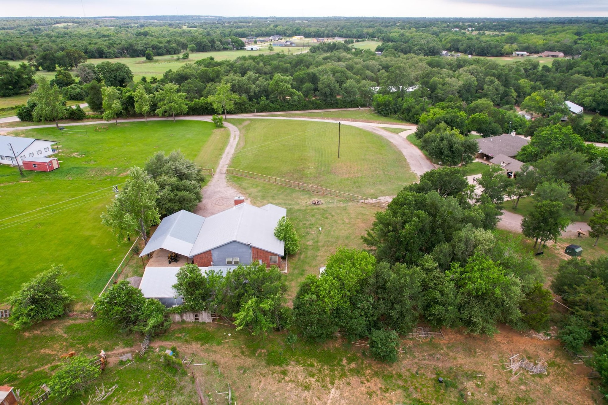 176 Old Lexington Road, Unit C Elgin, TX 78621 - Photo 26 of 31 a view of a house with a yard