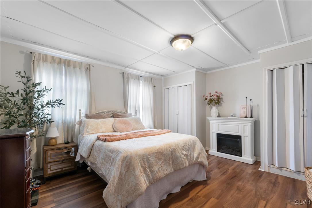 1226 Railroad Street Bethlehem, PA 18015 - Photo 11 of 20 a bedroom with a bed and a fireplace