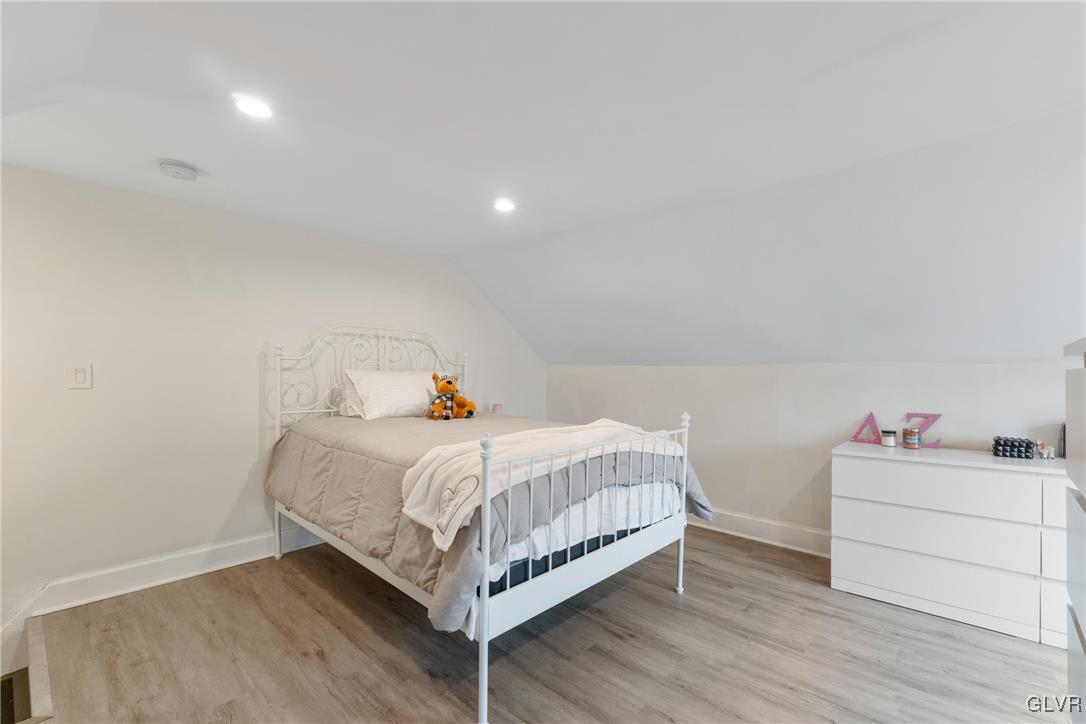 1226 Railroad Street Bethlehem, PA 18015 - Photo 13 of 20 a bedroom with a bed and a cabinets