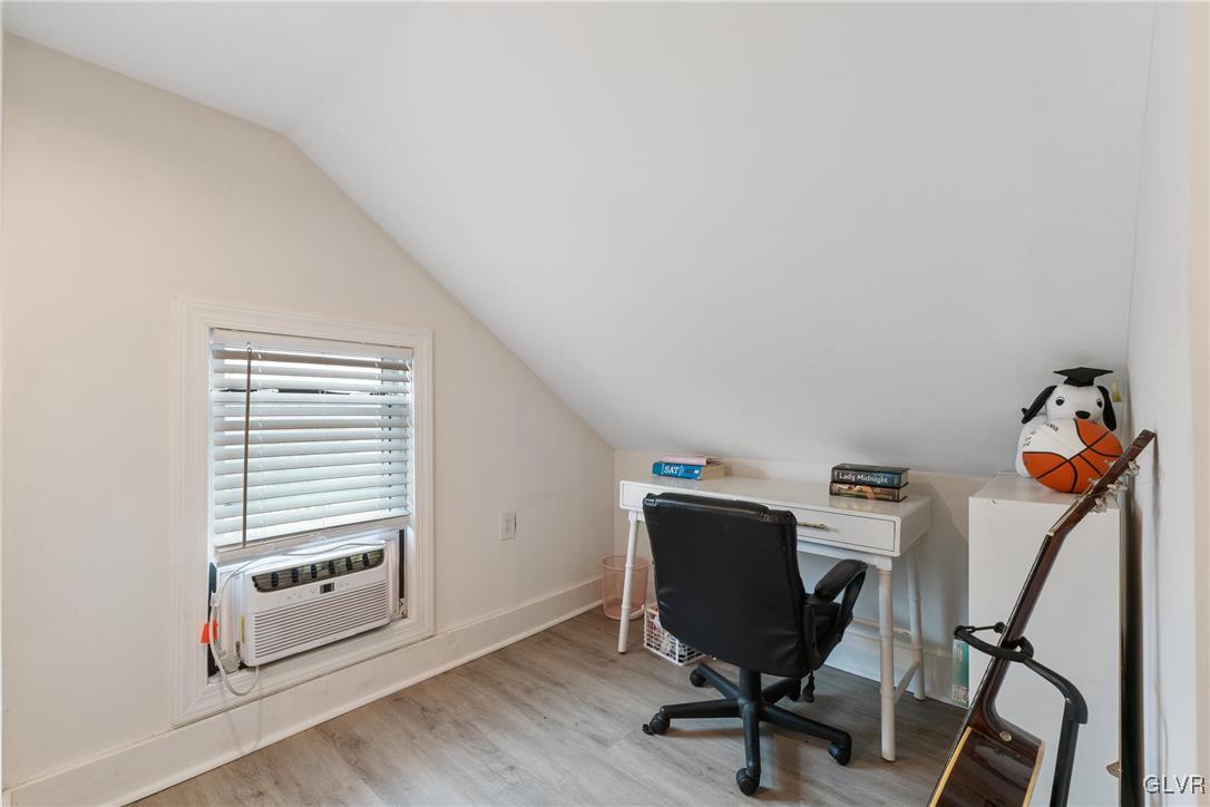 1226 Railroad Street Bethlehem, PA 18015 - Photo 16 of 20 a view of a workspace with furniture and a window