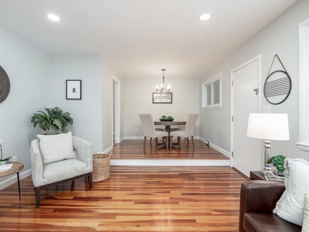 39 Marilyn Road Andover, MA 01810 - Photo 16 of 28 a living room with furniture and a wooden floor